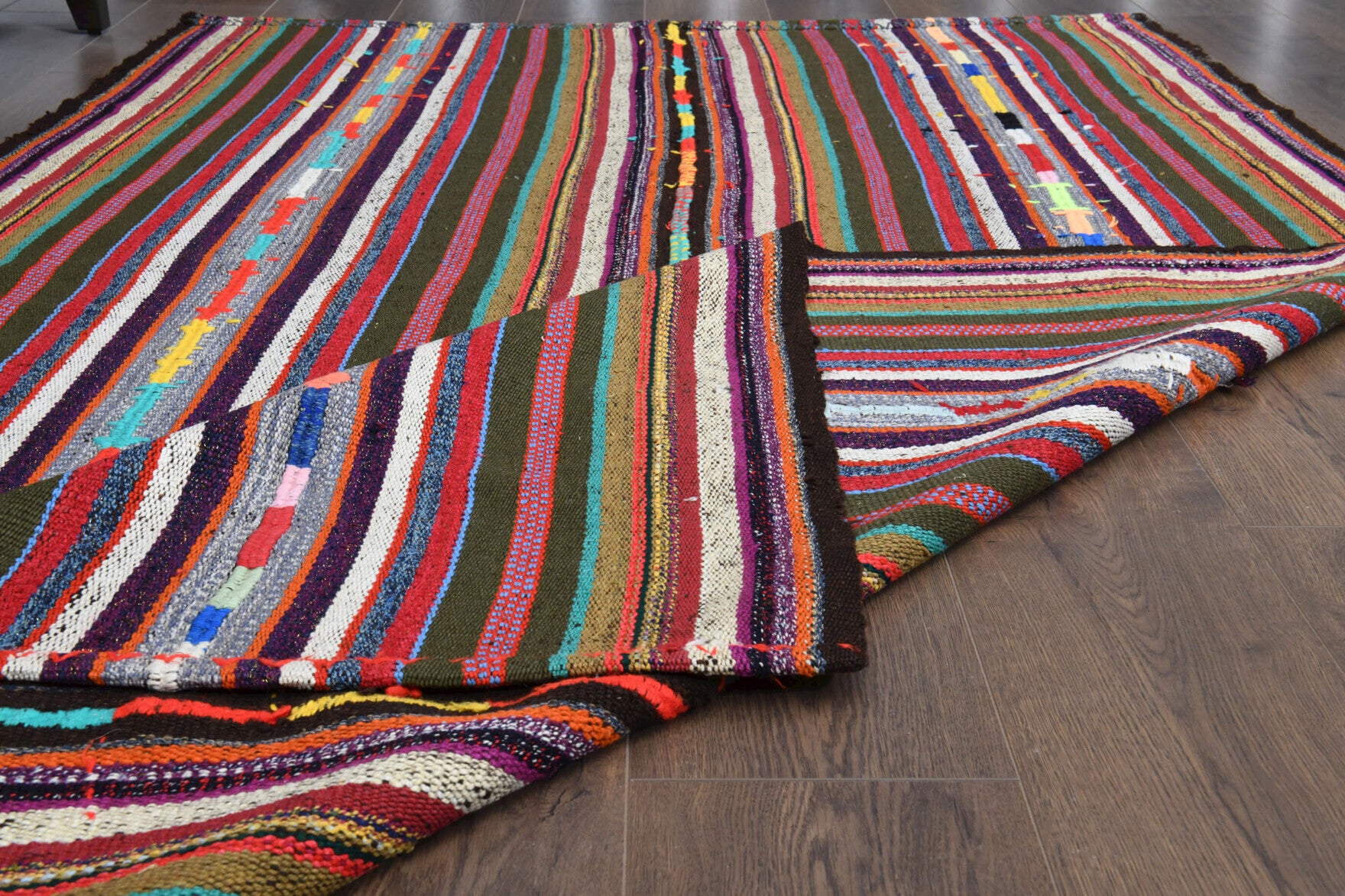 Nehirsad kilim: 1960s handwoven flatweave Anatolian kilim with striped motifs and fabric backing