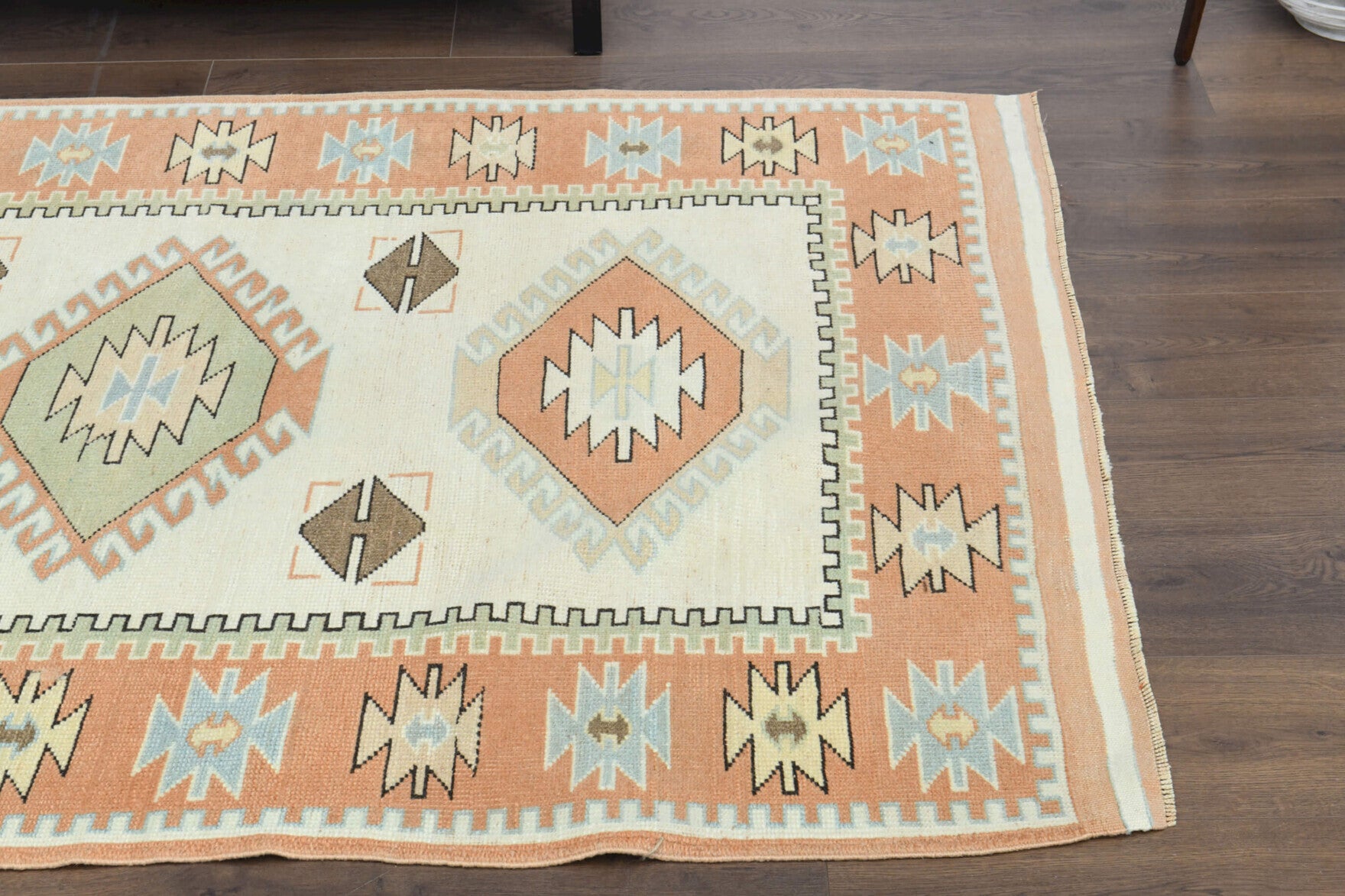Mehyaz rug: 1970s handmade Anatolian rug with oriental motifs and cotton backing