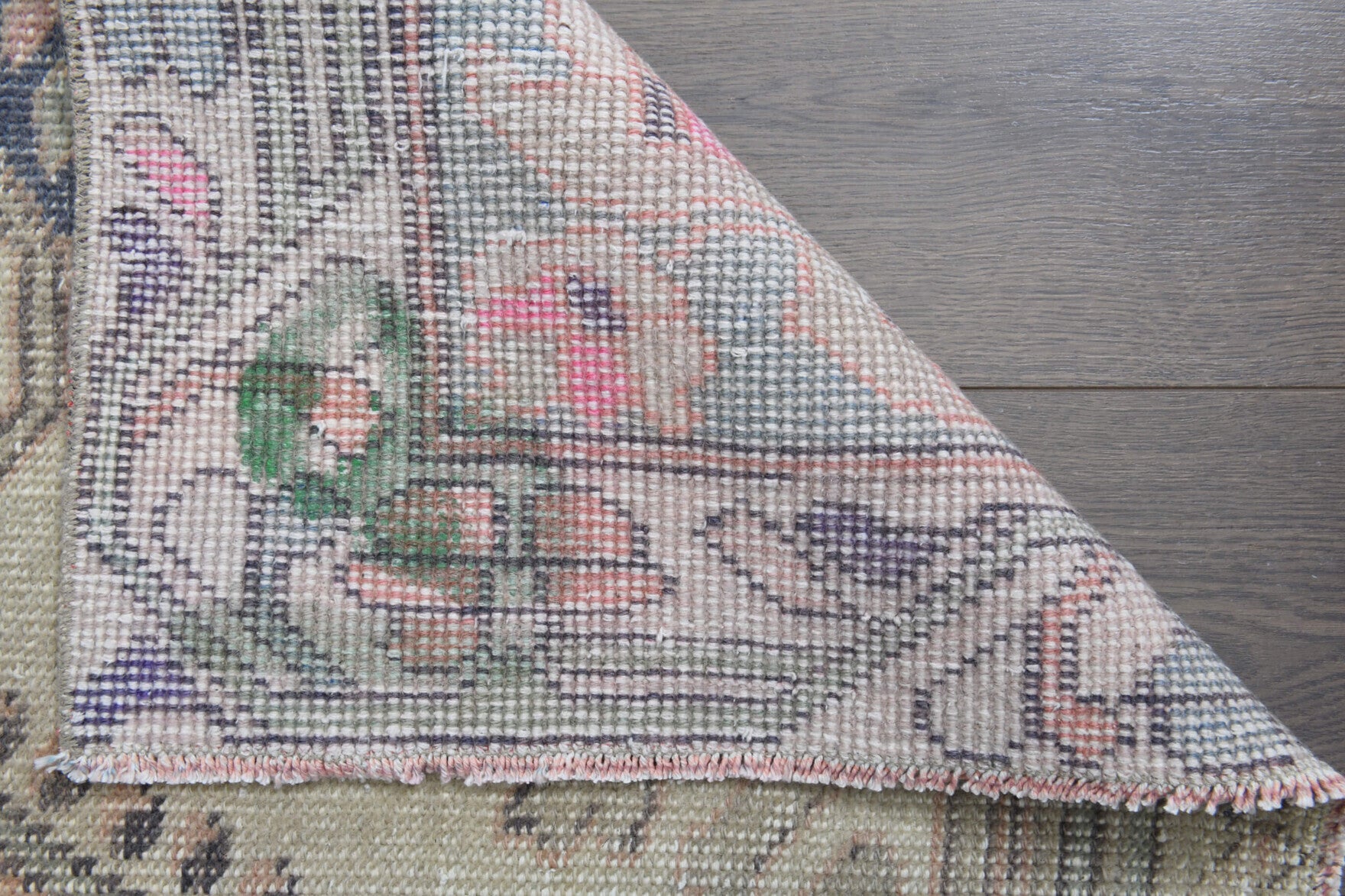 Zeyneperi rug: 1970s handmade Anatolian rug with oriental motifs and cotton backing