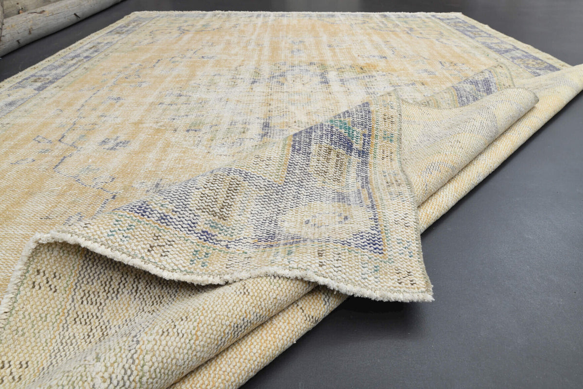 Fulyadil rug: 1970s handmade Anatolian rug with oriental motifs and cotton backing