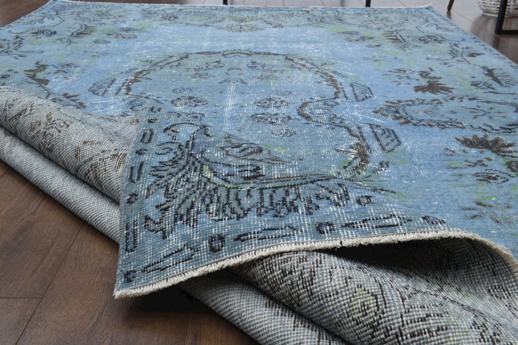 Elifbike rug: 1970s handmade Anatolian rug with oriental motifs and cotton backing