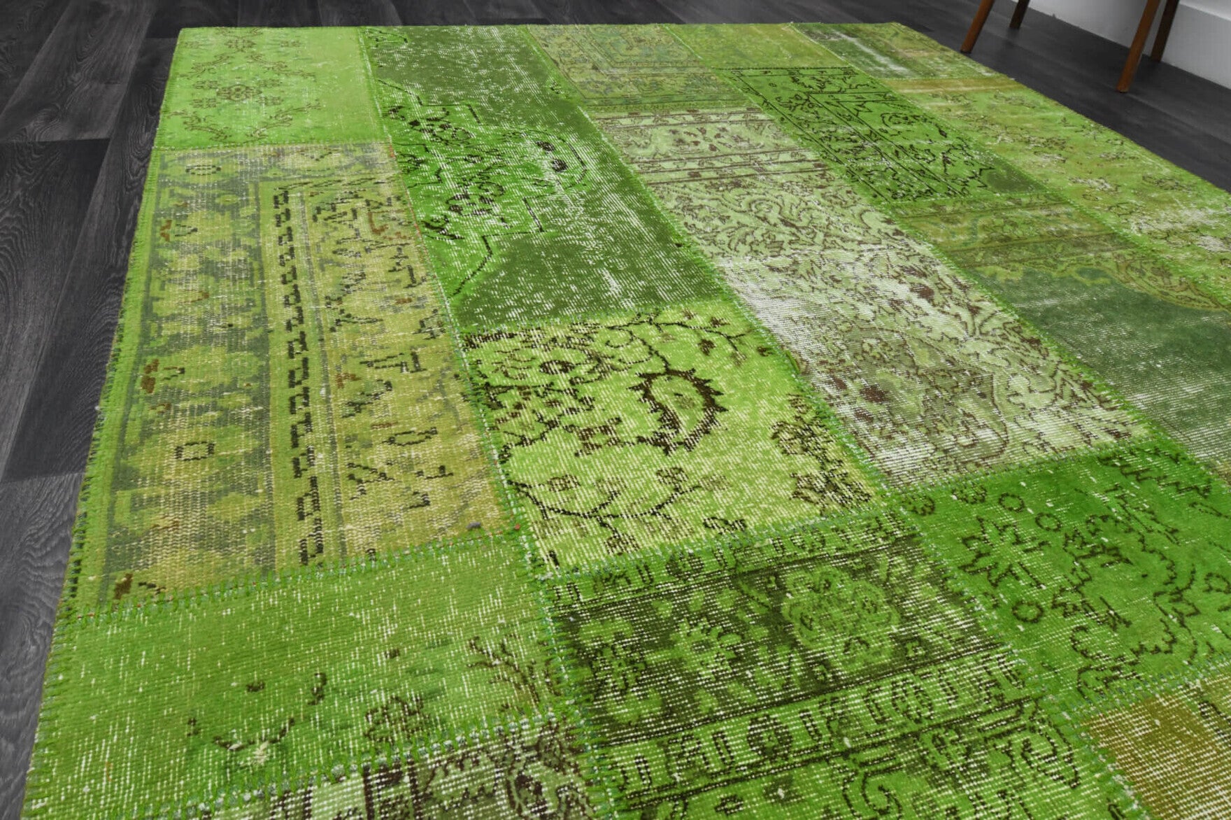 Chrysokome rug: 1960s handmade Anatolian rug with floral motifs and fabric backing