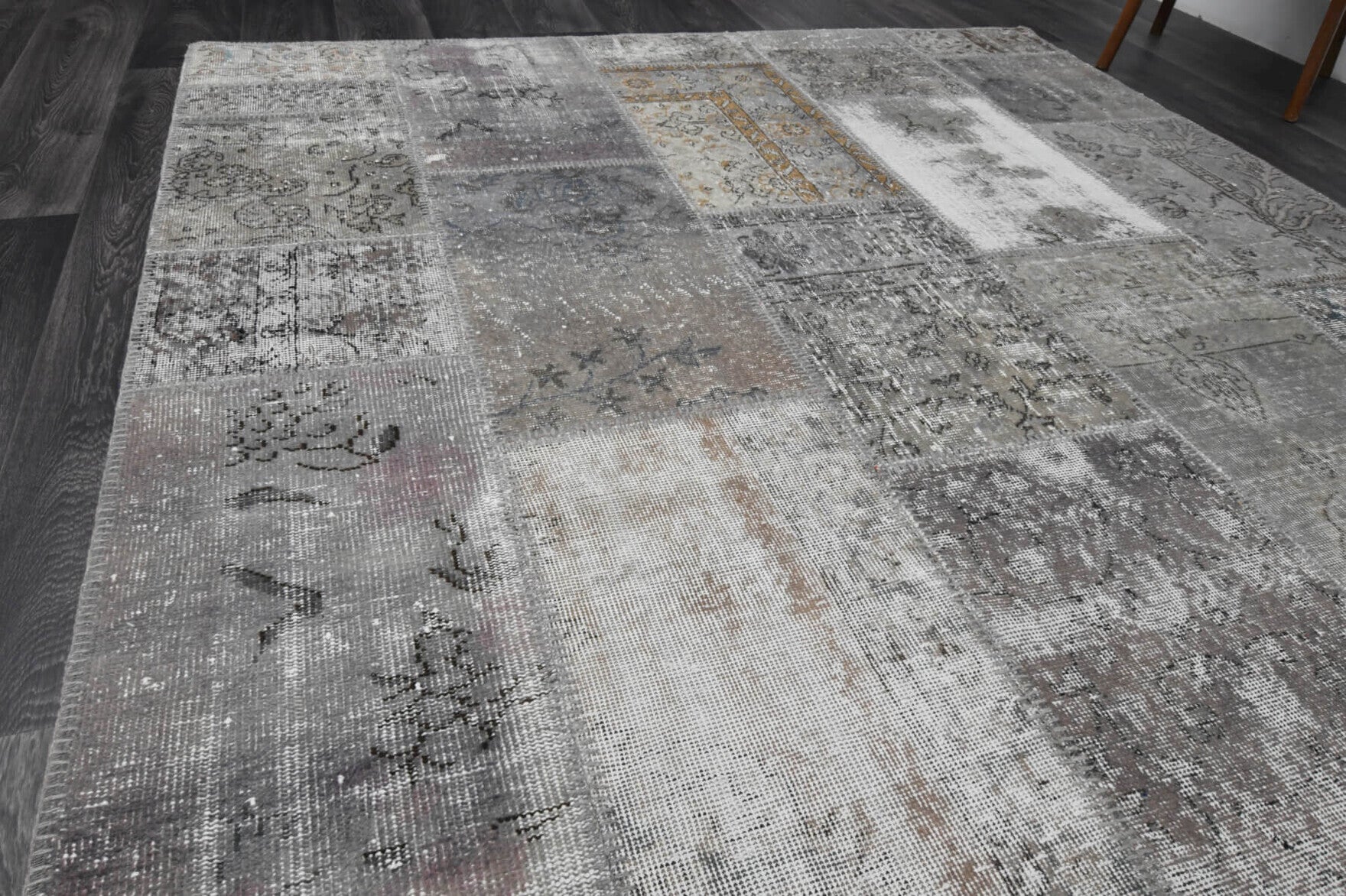 Ceviz rug: 1960s handmade Anatolian rug with solid motifs and fabric backing