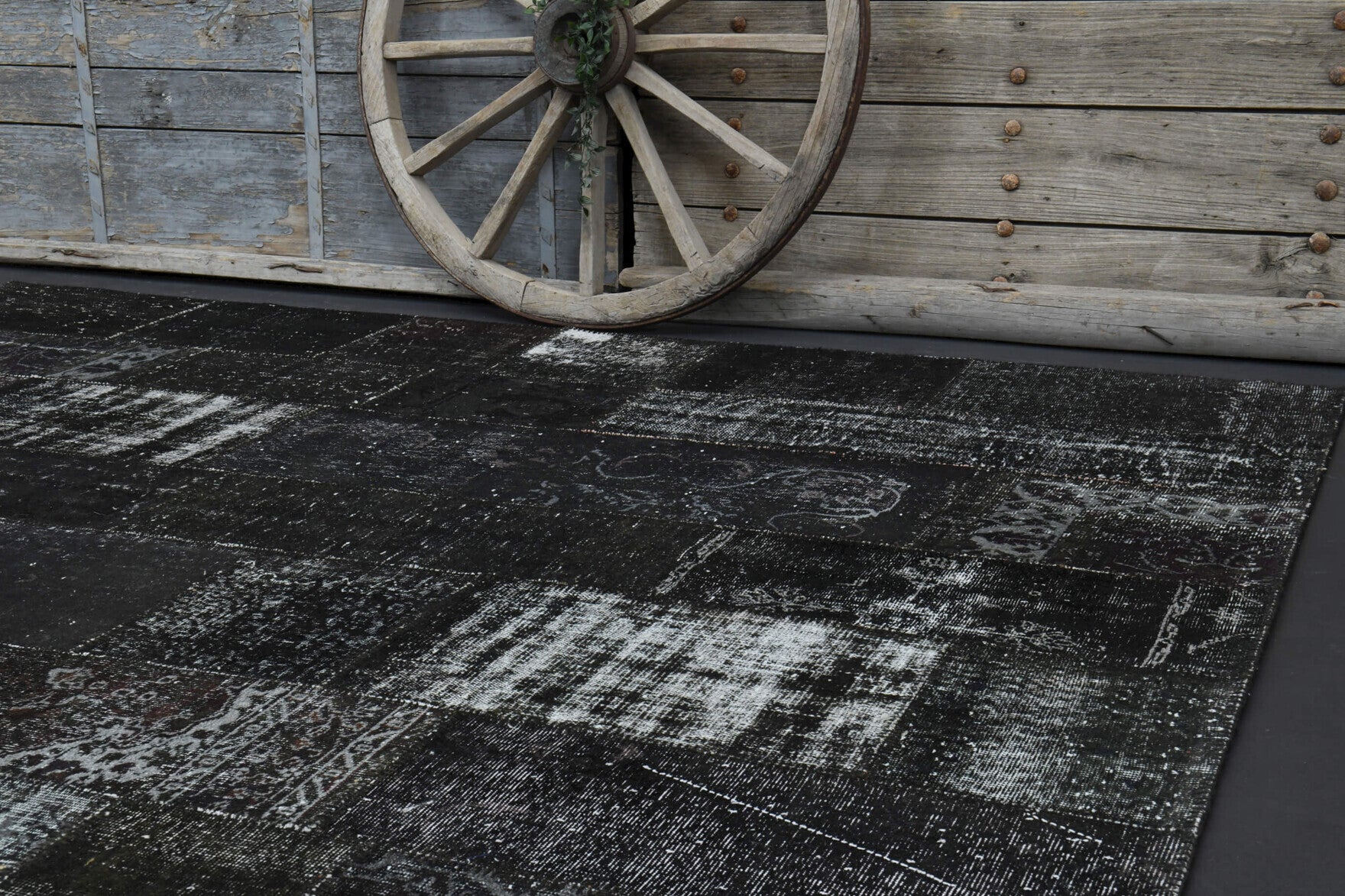 Bozcaada rug: 1980s handmade Anatolian rug with solid motifs and fabric backing