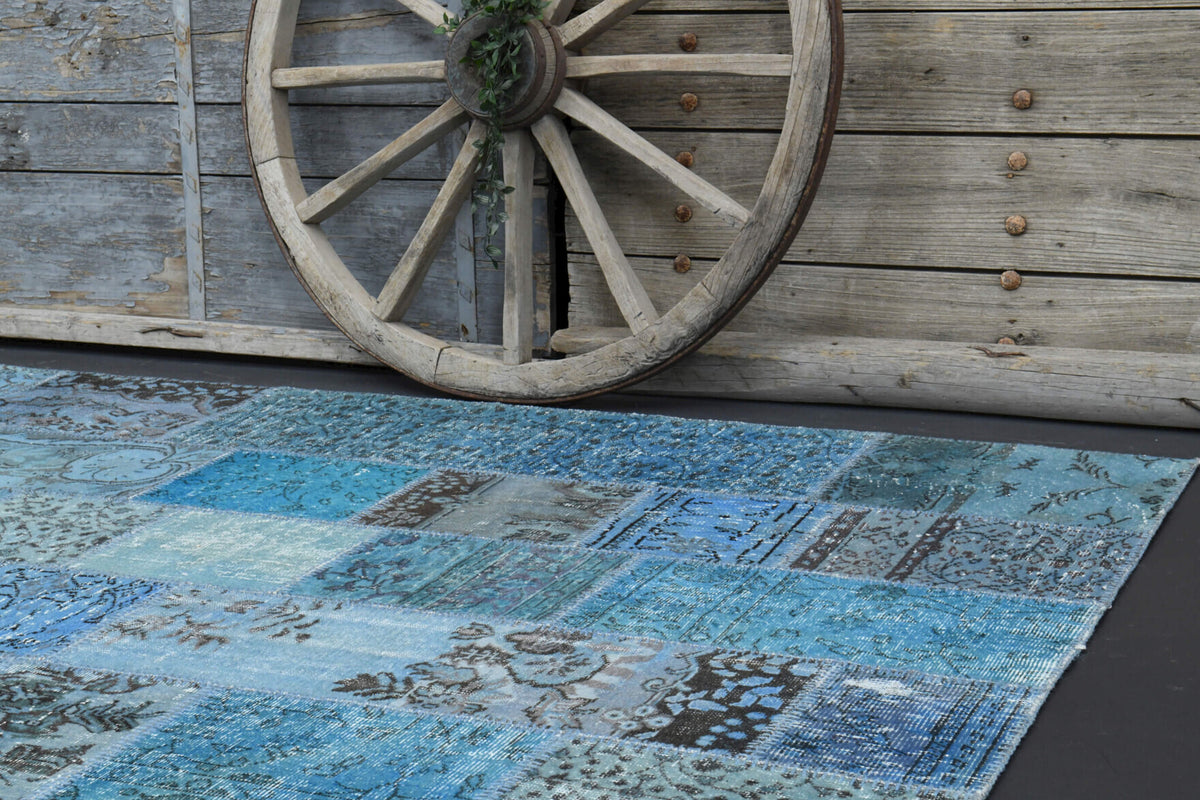 Bestesel rug: 1960s handmade Anatolian rug with solid motifs and fabric backing