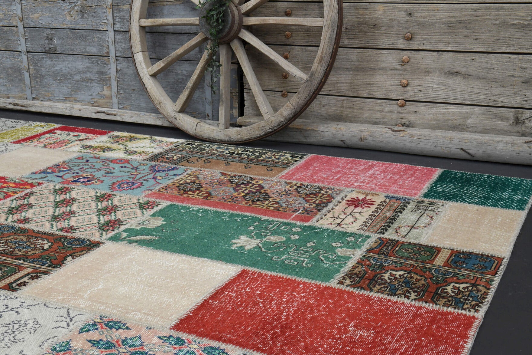 Bahrisev rug: 1970s handmade Anatolian rug with patchwork motifs and fabric backing