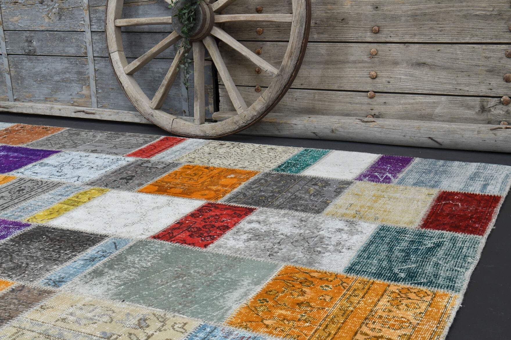 Bademgonca rug: 1960s handmade Anatolian rug with oriental motifs and fabric backing