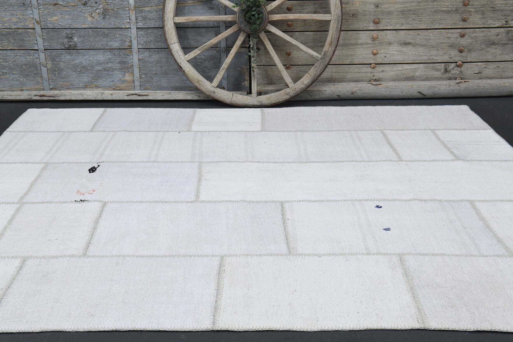 Astypalea rug: 1980s handmade Anatolian rug with solid motifs and fabric backing
