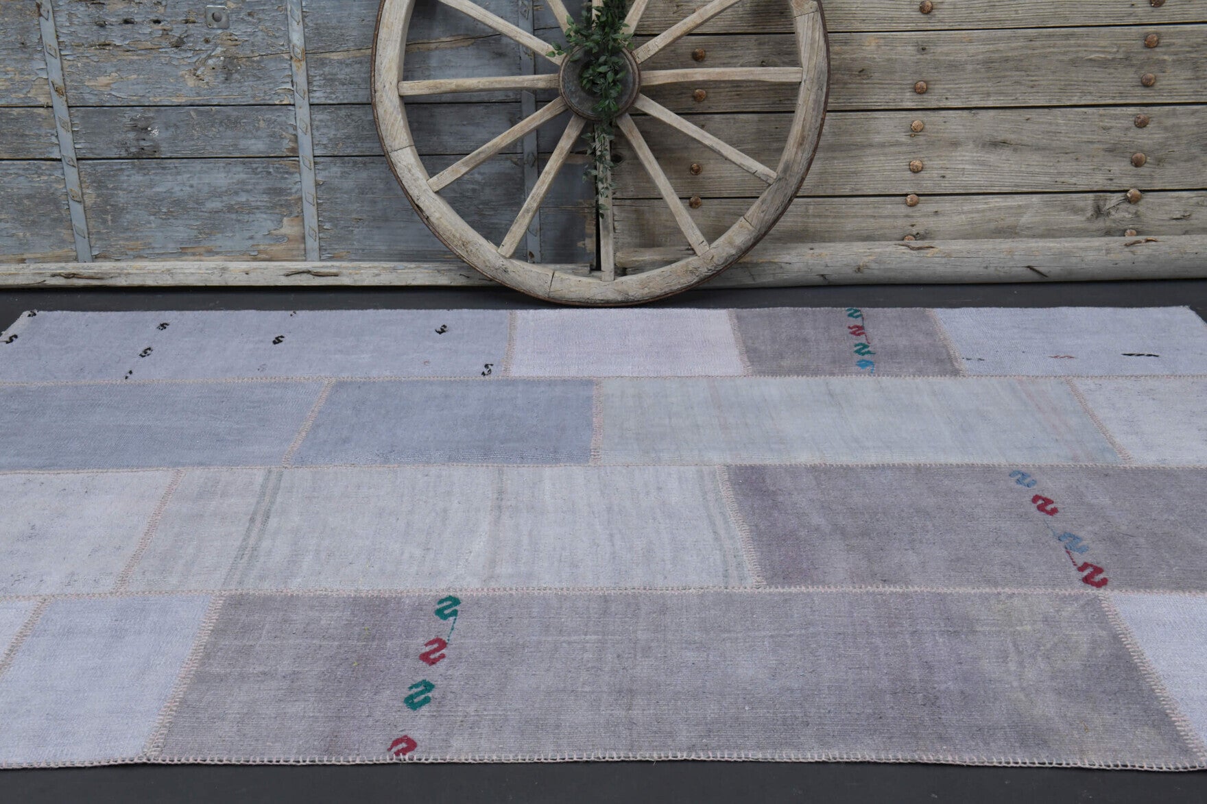 Astrakome rug: 1970s handmade Anatolian rug with solid motifs and fabric backing