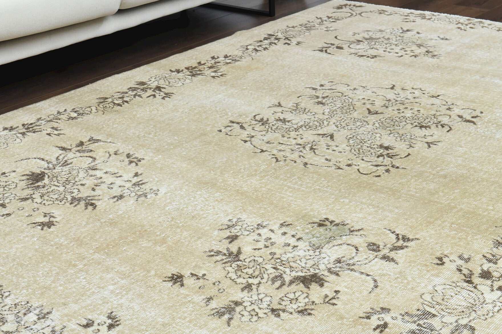 Tarabtac rug: 1970s handmade Turkish rug with floral motifs and cotton backing