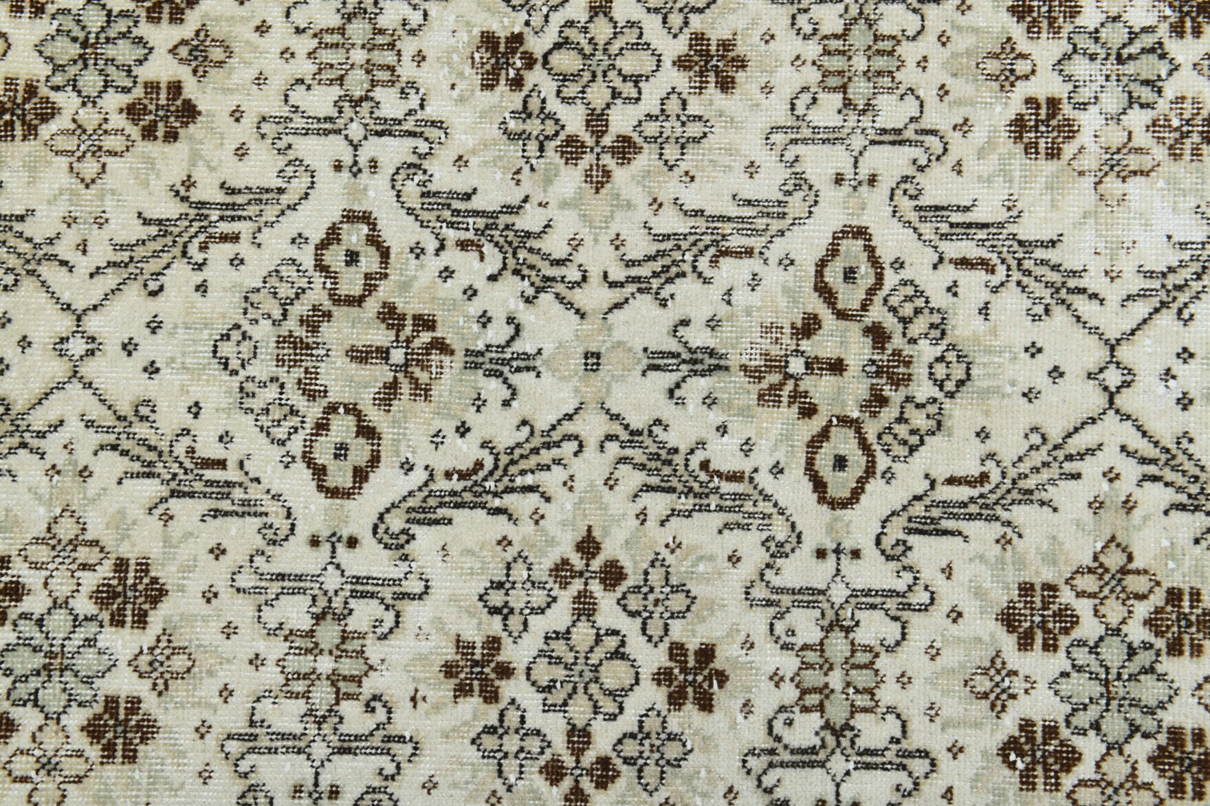 Berilsel rug: 1970s handmade Anatolian rug with floral motifs and cotton backing