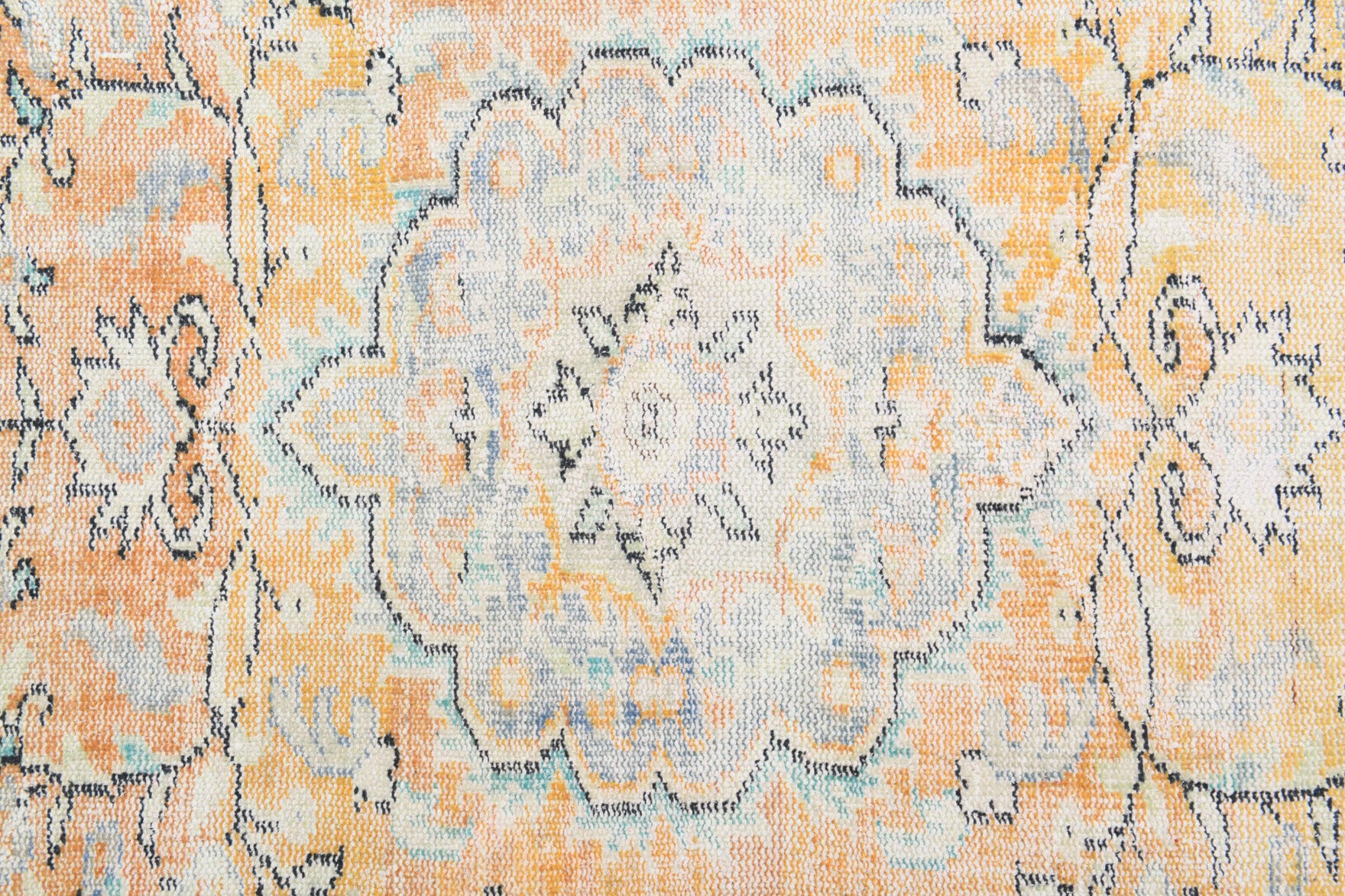 Berrakdil rug: 1970s handmade Anatolian rug with oriental motifs and cotton backing