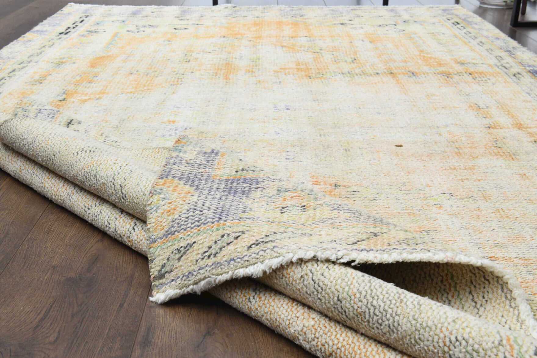 Bulutnisin rug: 1940s handmade Anatolian rug with abstract motifs and cotton backing