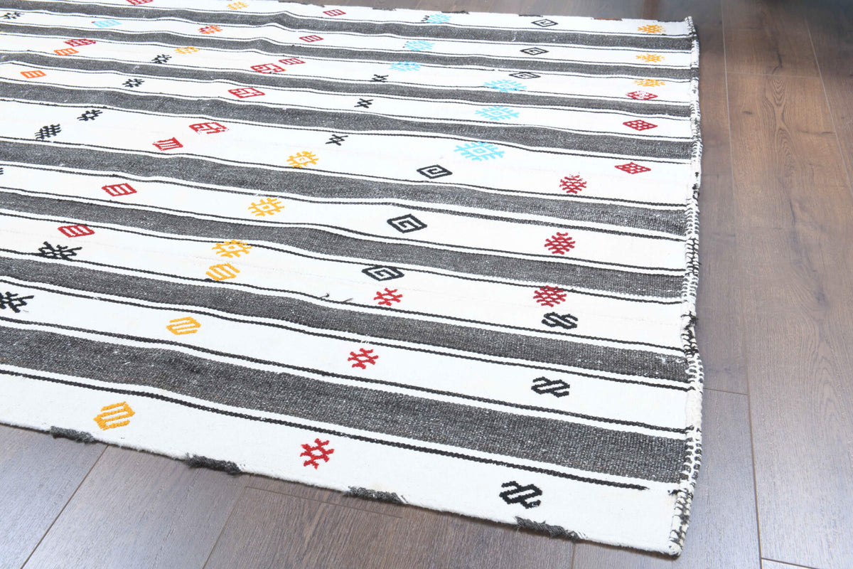 Aygulnur kilim: 1960s handwoven flatweave Anatolian kilim with striped motifs
