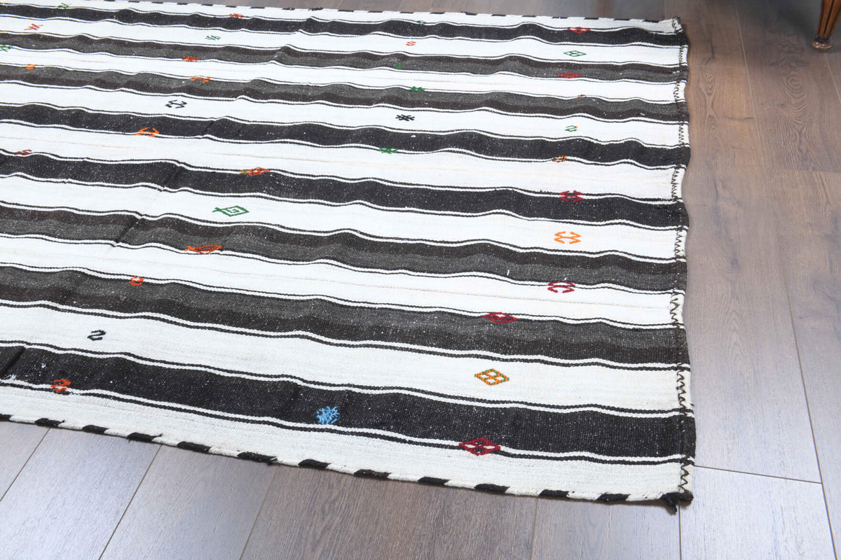 Asunil kilim: 1960s handwoven flatweave Anatolian kilim with striped motifs