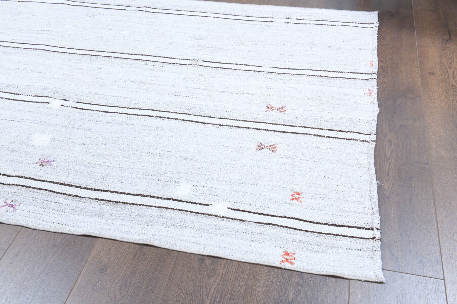 Altinsever kilim: 1960s handwoven flatweave Anatolian kilim with ikat motifs