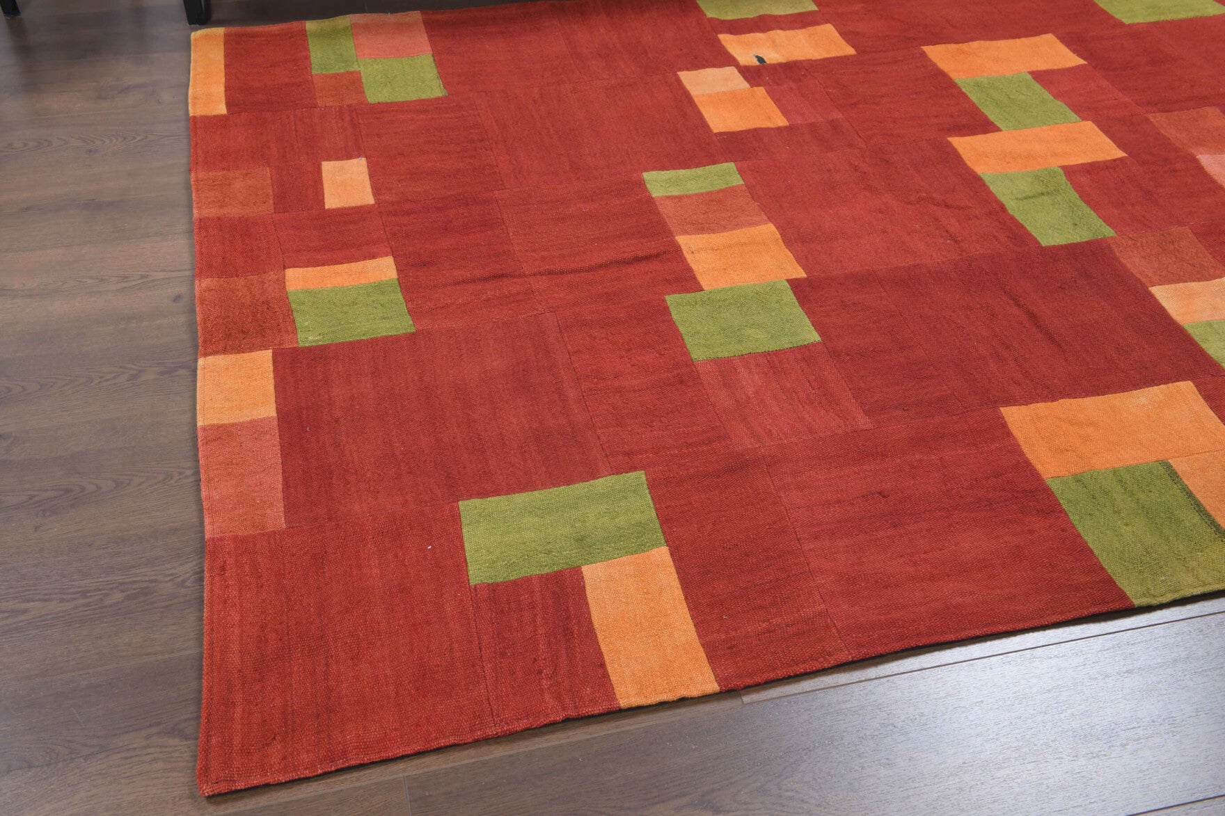 Smaragdokome rug: 1970s handmade Anatolian rug with solid motifs and fabric backing