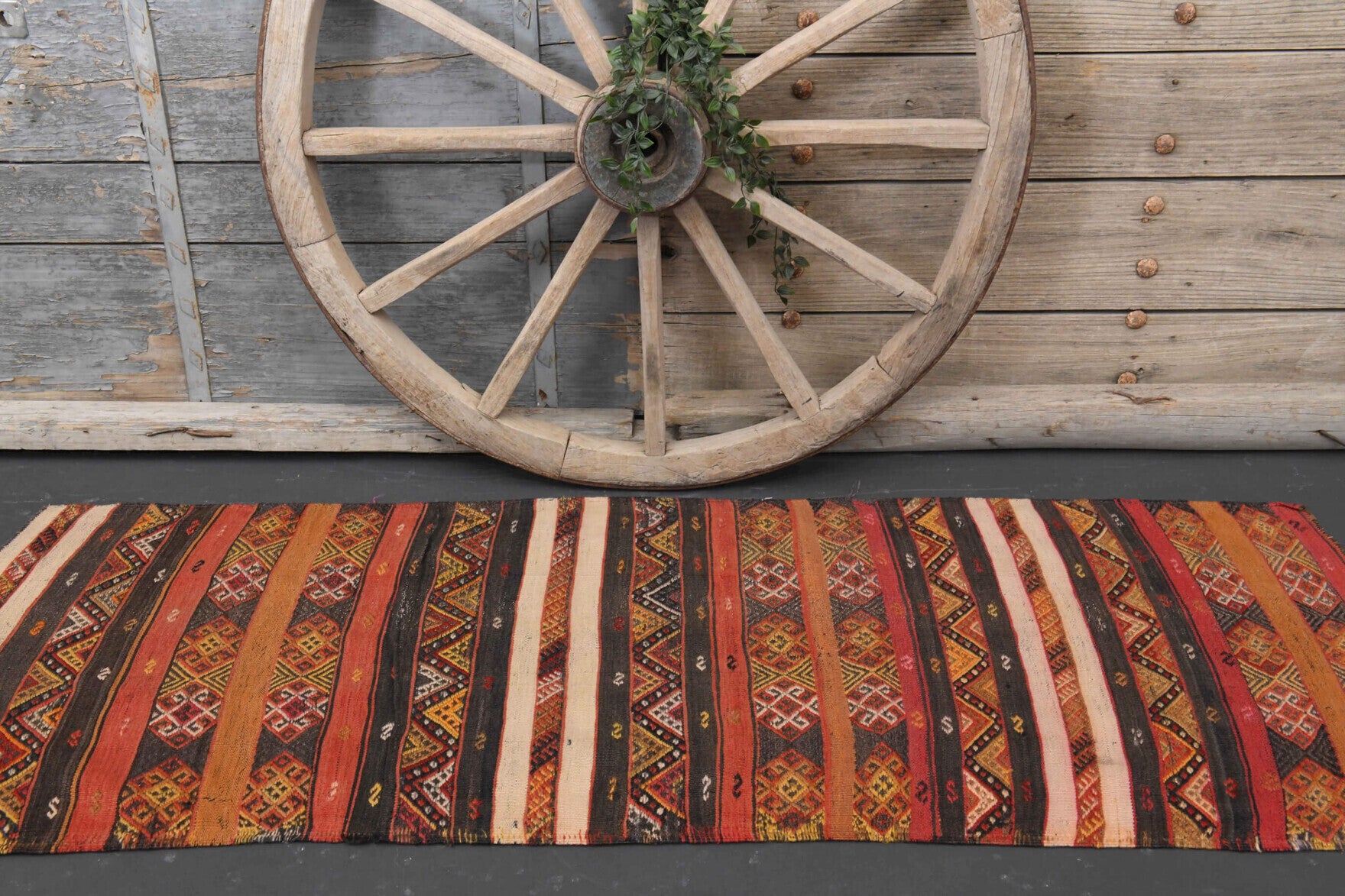 Servsah kilim: 1970s handwoven flatweave Anatolian kilim with ikat motifs and cotton backing