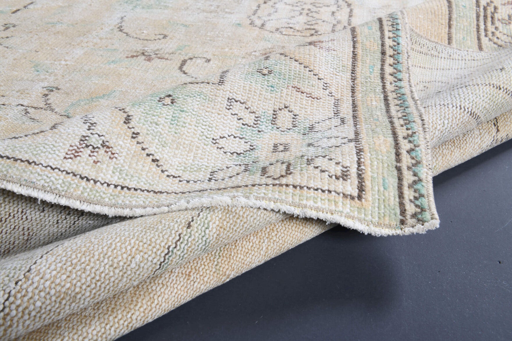 Basak rug: 1970s handmade Anatolian rug with oriental motifs and cotton backing