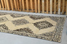 Glykokrateia runner: 1970s handmade Anatolian runner with oriental motifs and cotton backing