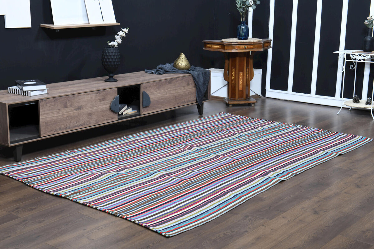 Sunbulcihan kilim: 1960s handwoven flatweave Anatolian kilim with striped motifs