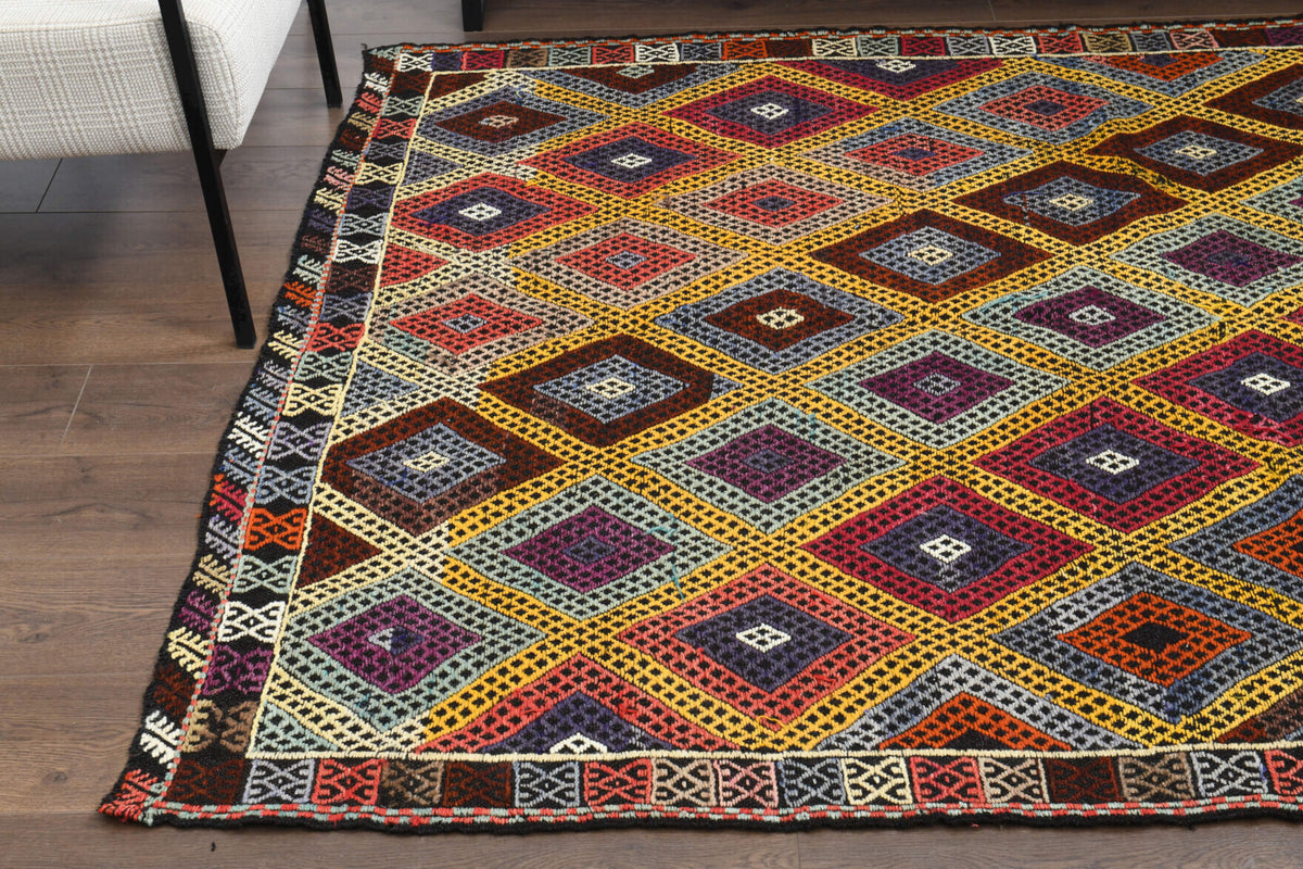 Nisansah kilim: 1960s handwoven flatweave Anatolian kilim with ikat motifs