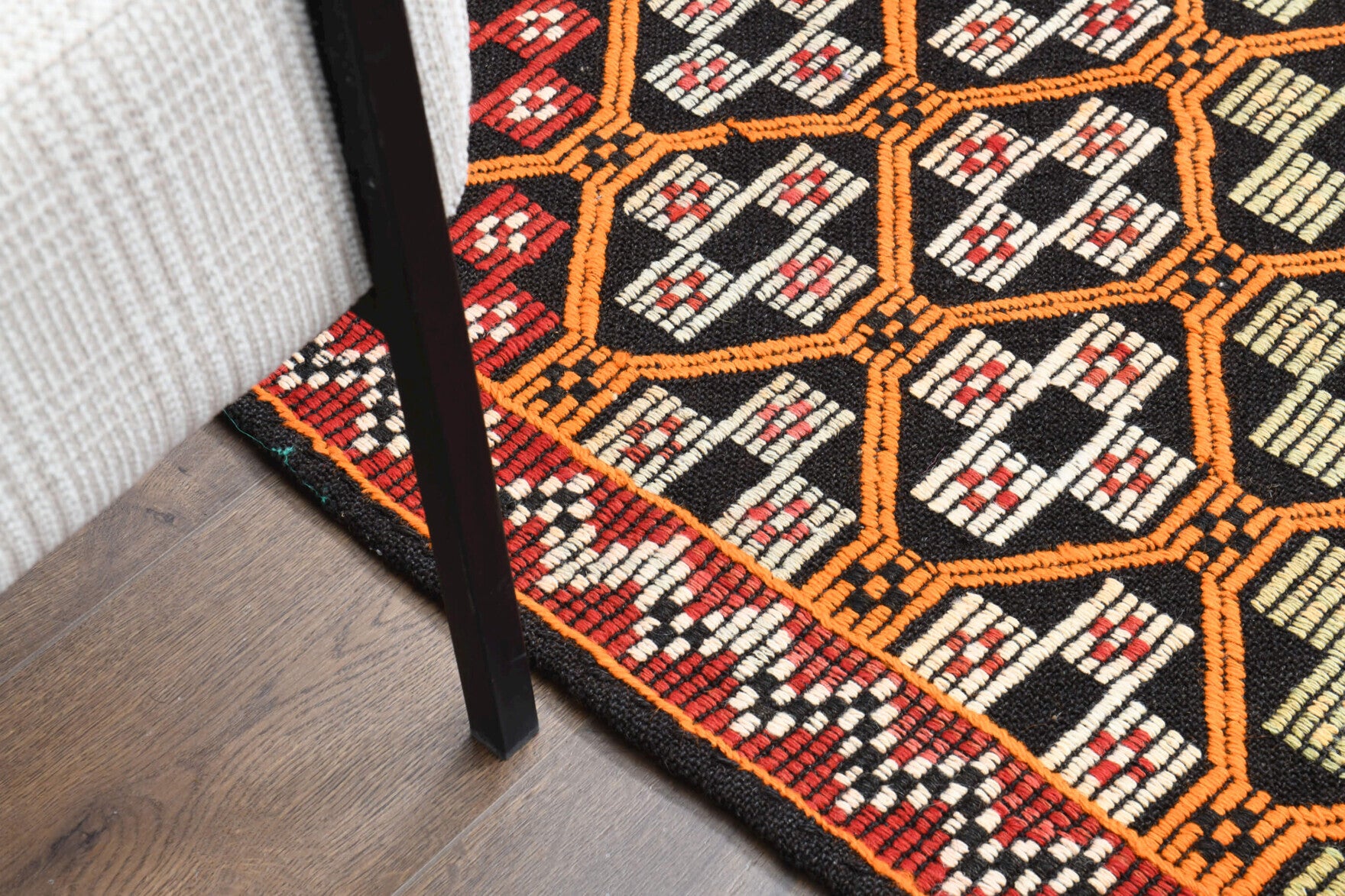 Kadifesel kilim: 1960s handwoven flatweave Anatolian kilim with ikat motifs