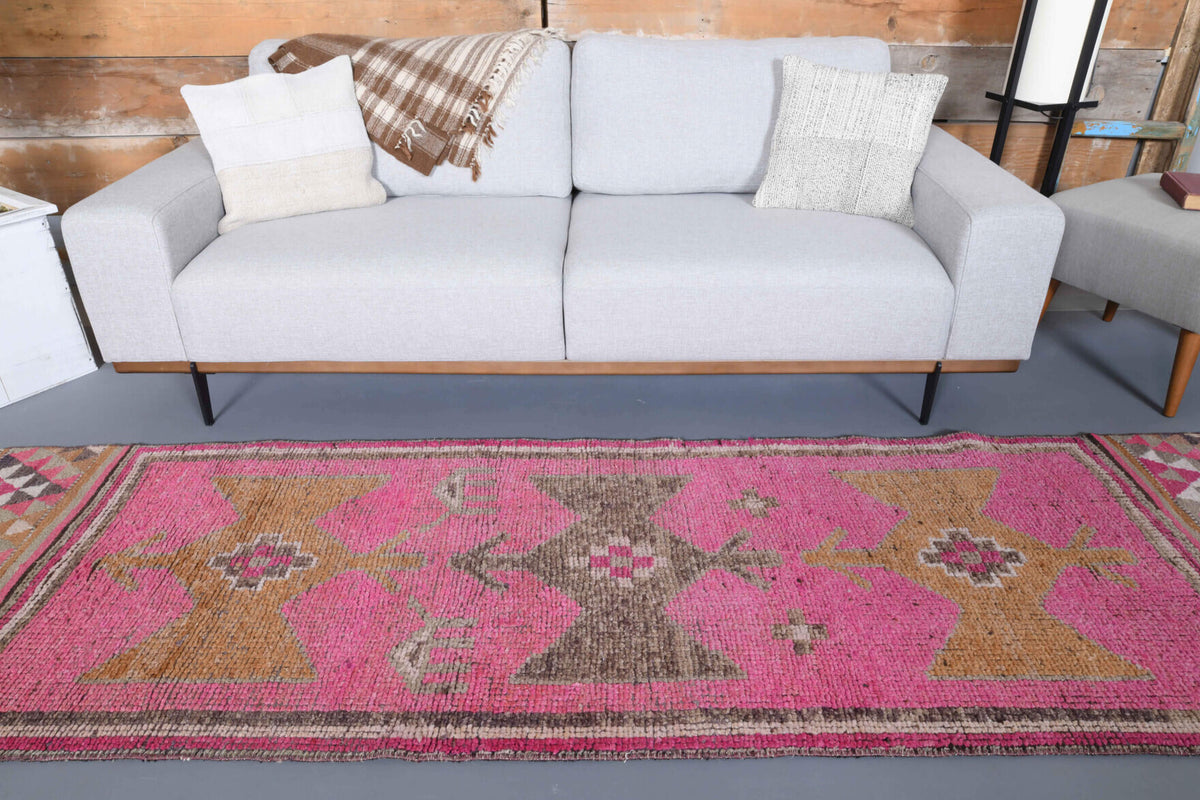 Leucozoe runner: 1970s handmade Anatolian runner with tribal motifs and cotton backing