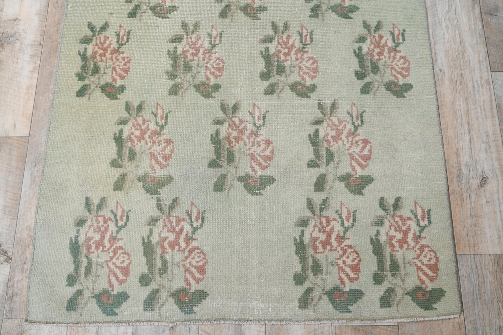 Farangis rug: 1970s handmade Anatolian rug with floral motifs and cotton backing