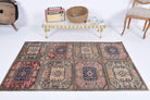 Betulnur rug: 1970s handmade Anatolian rug with ikat motifs and cotton backing