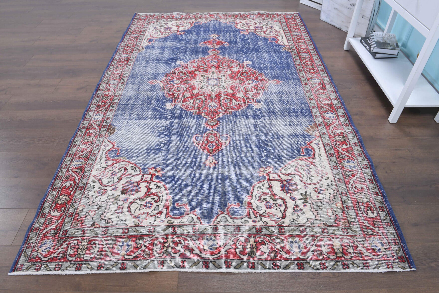 Isikara rug: 1970s handmade Anatolian rug with oriental motifs and cotton backing