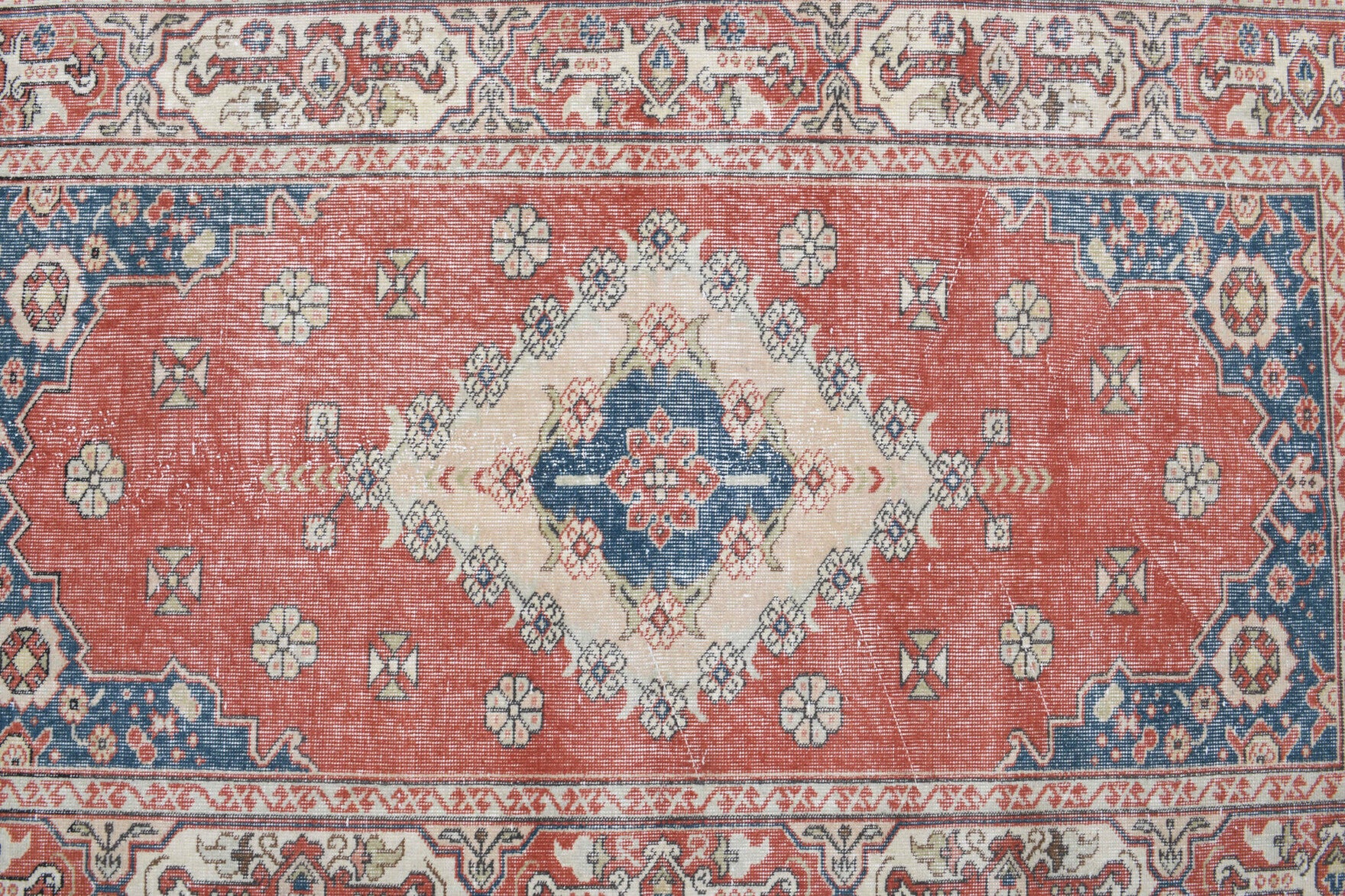 Iliophyllis rug: 1970s handmade Anatolian rug with oriental motifs and cotton backing