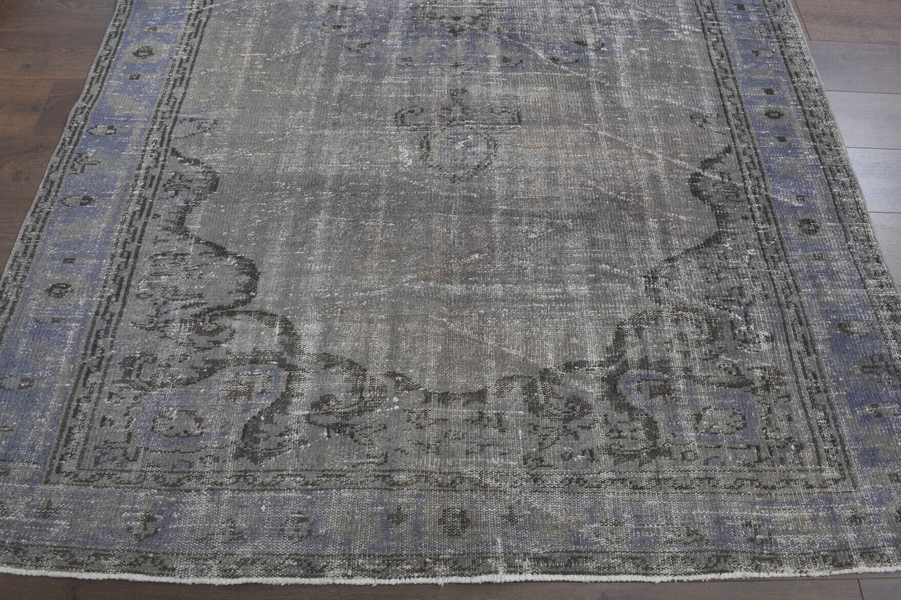 Nevruznur rug: 1970s handmade Anatolian rug with oriental motifs and cotton backing