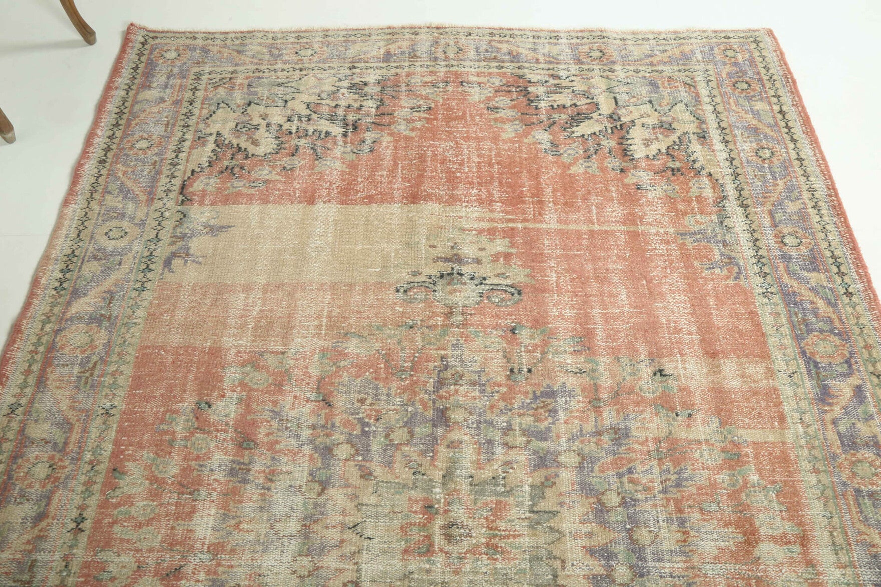 Authentic Anatolian distressed vintage area rug (1950s) with floral design – one-of-a-kind at Fame Rugs