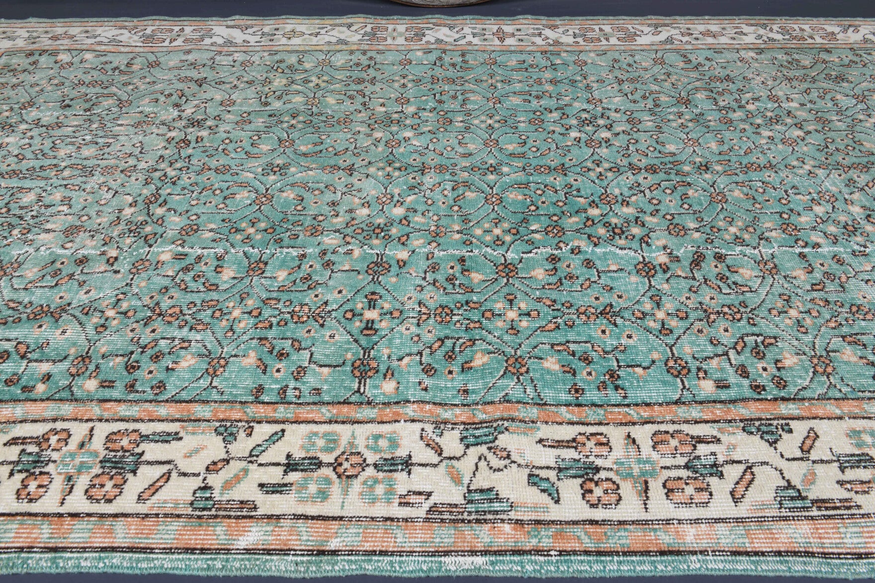 Berraknihal rug: 1970s handmade Anatolian rug with floral motifs and cotton backing