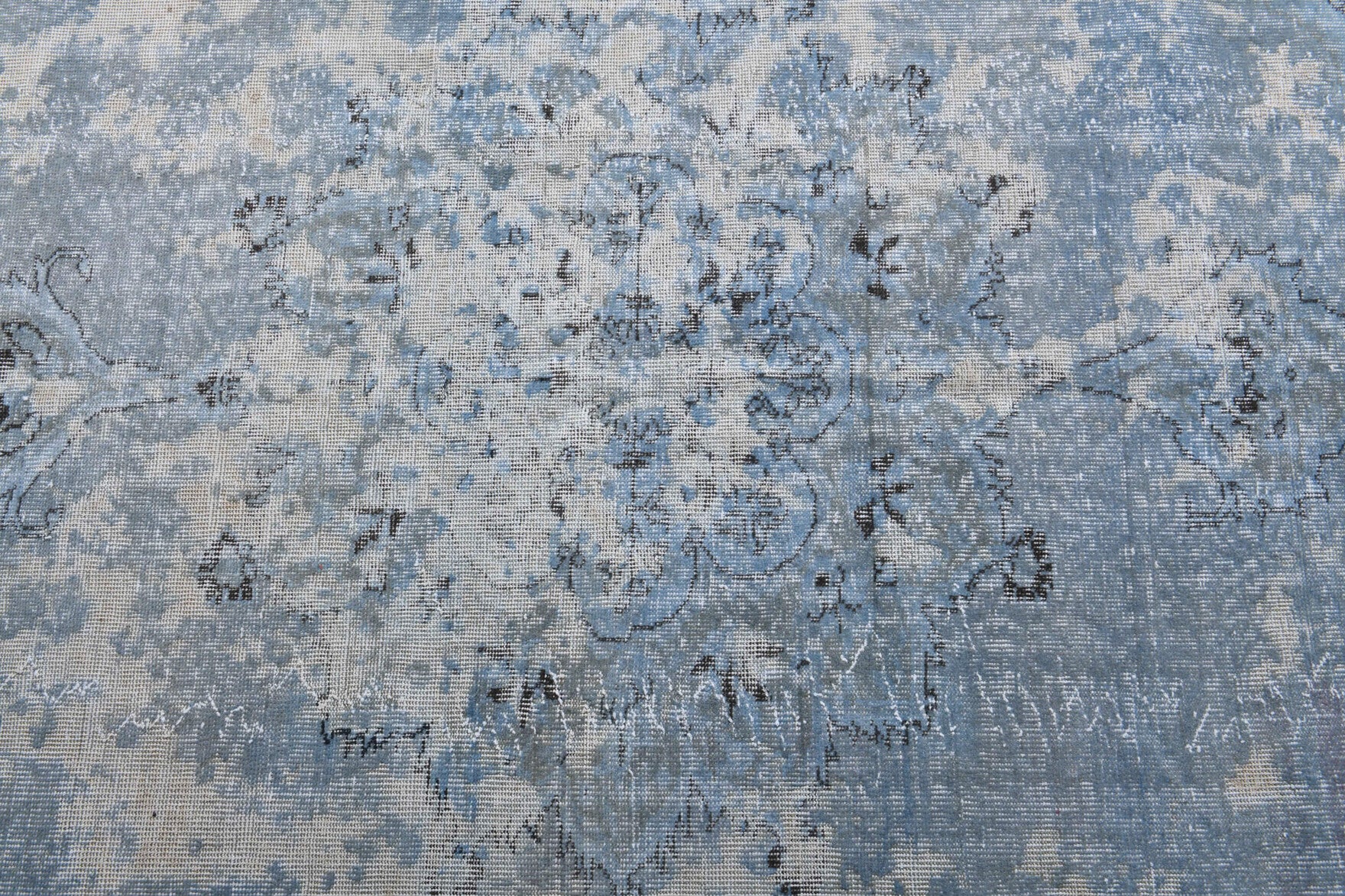 Berilsema rug: 1970s handmade Anatolian rug with floral motifs and cotton backing