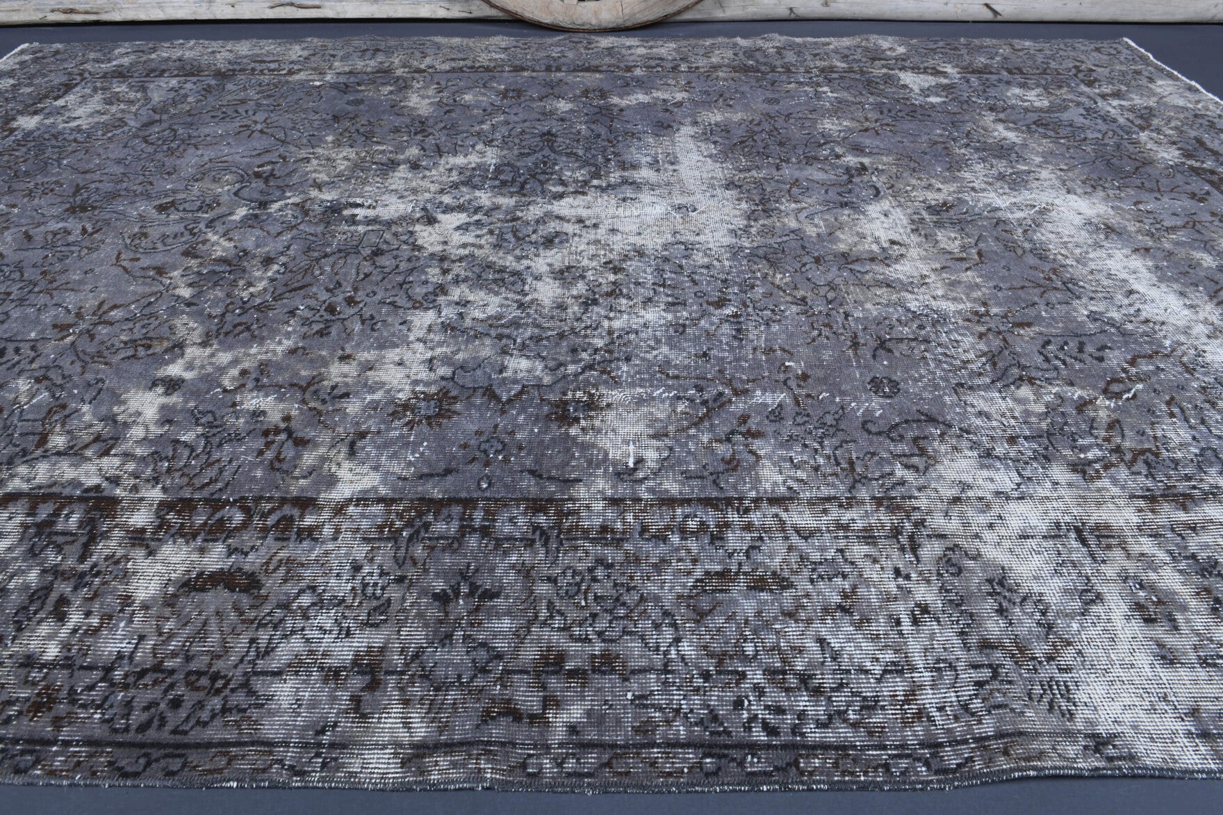 Baharmelek rug: 1960s handmade Anatolian rug with floral motifs and cotton backing