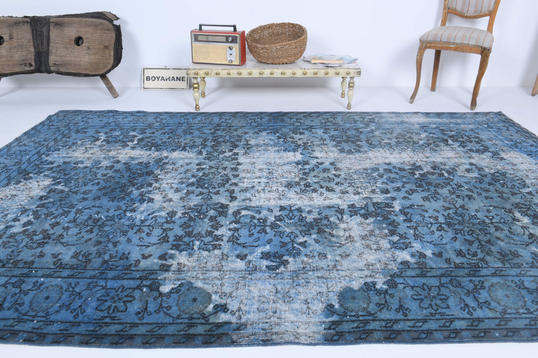 Ayara rug: 1970s handmade Anatolian rug with floral motifs and cotton backing