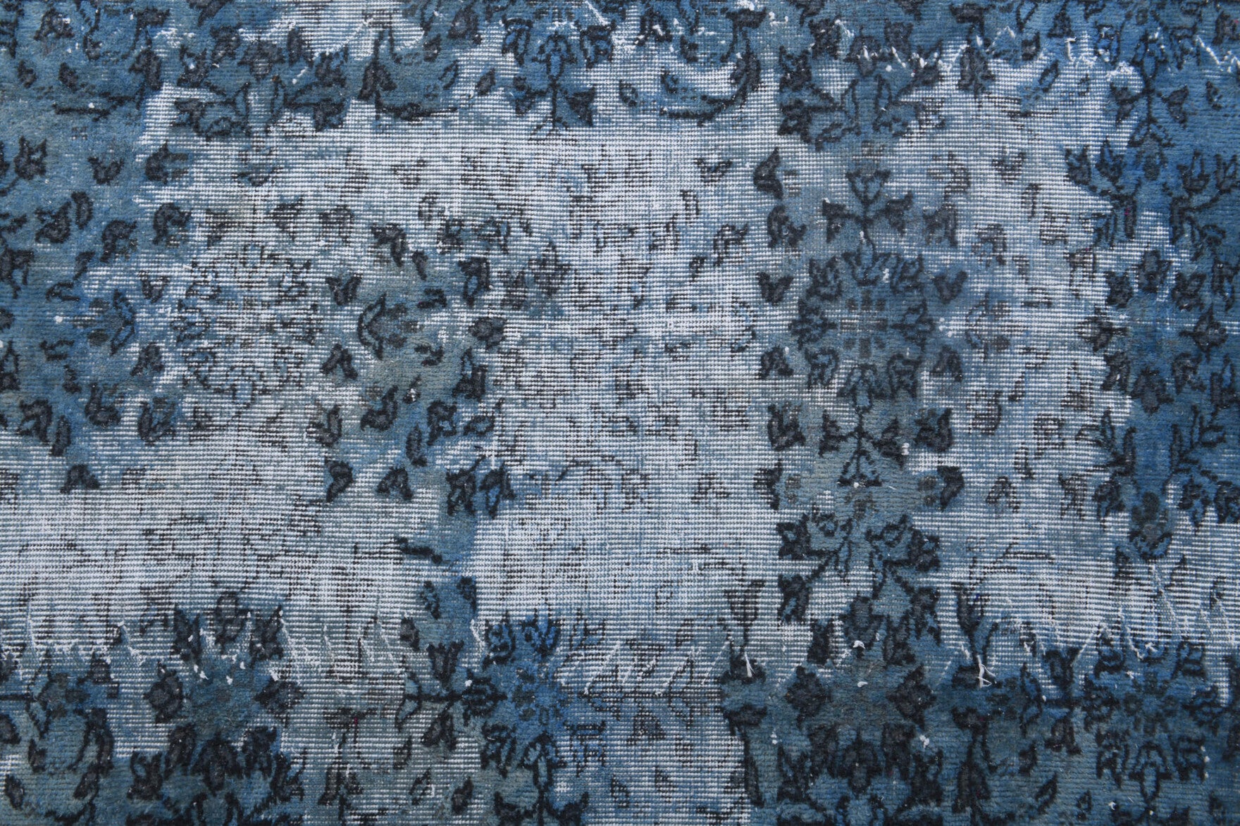 Authentic Anatolian distressed vintage area rug (1970s) with floral design – one-of-a-kind at Fame Rugs
