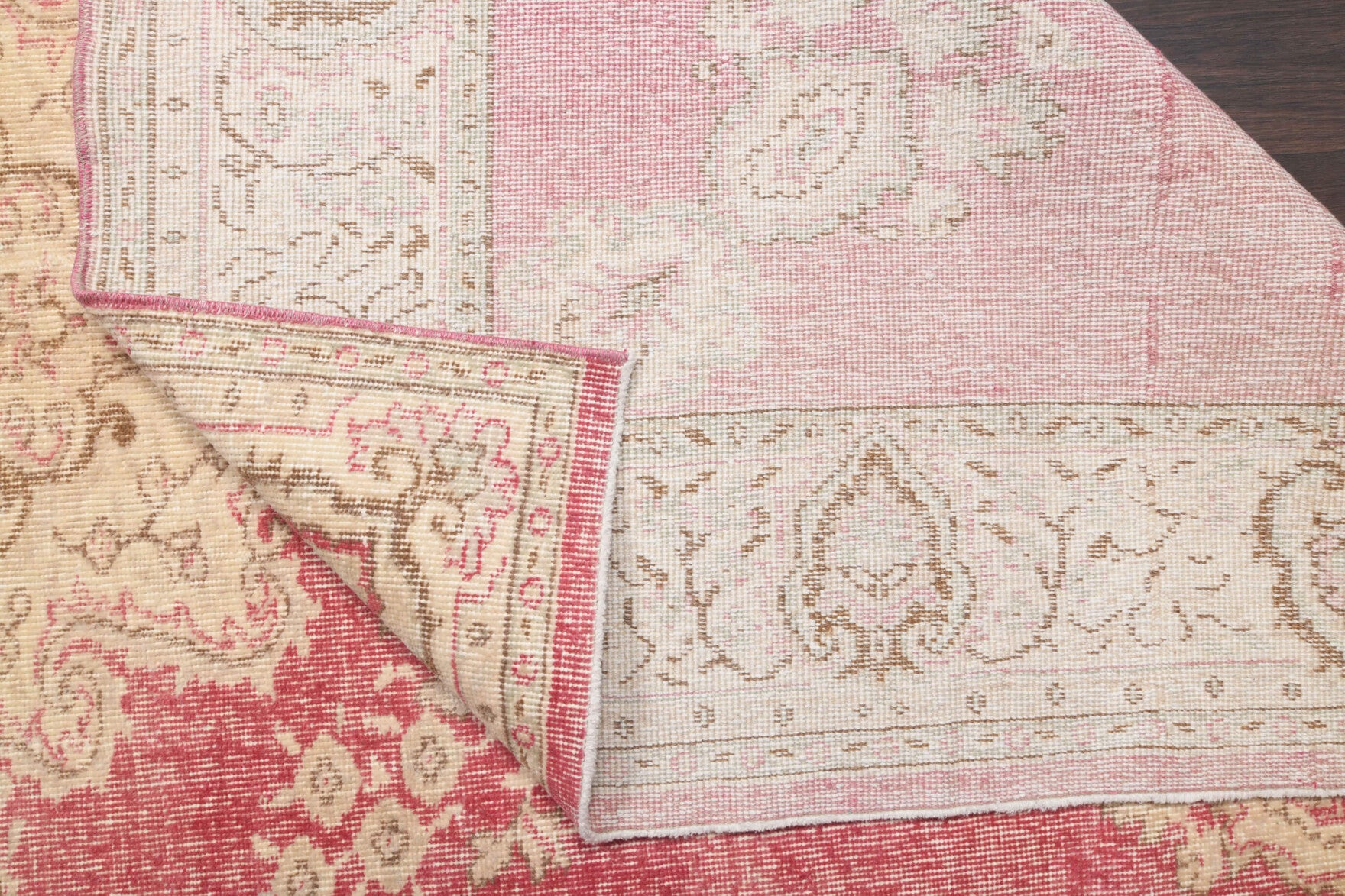 Aristochoria rug: 1970s handmade Anatolian rug with bordered and oriental motifs and cotton backing