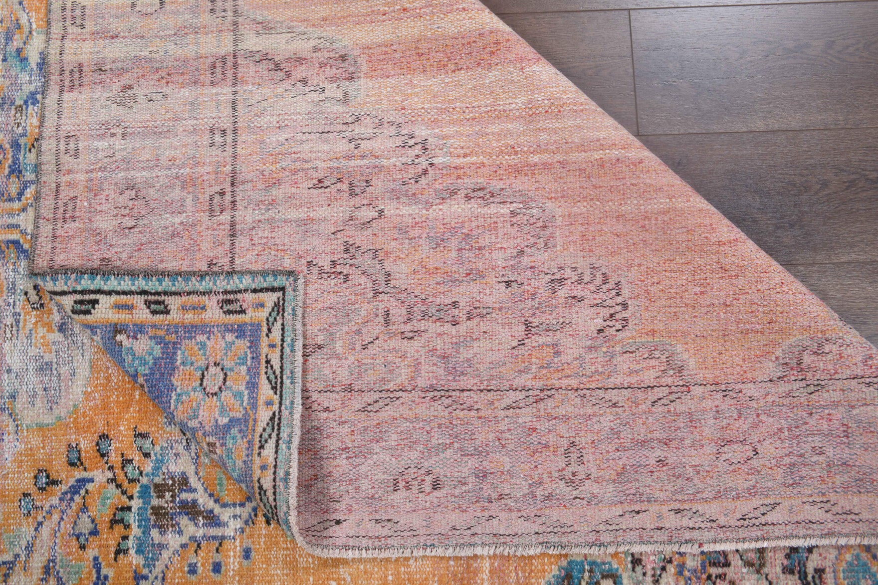 Stenothea rug: 1970s handmade Anatolian rug with oriental motifs and cotton backing