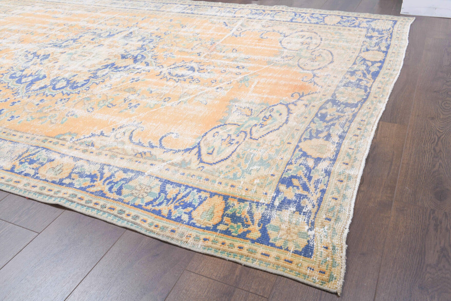 One-of-a-kind 1950s Anatolian distressed vintage area rug in wool, 6' x 9'1"