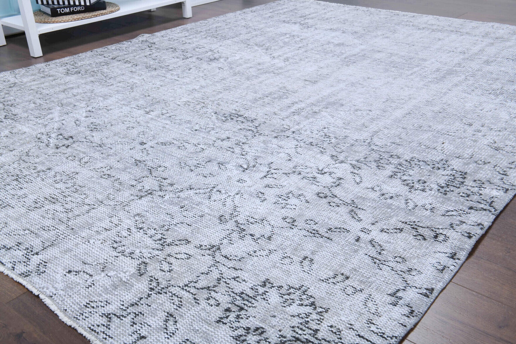 Semasena rug: 1950s handmade Anatolian rug with floral motifs and cotton backing