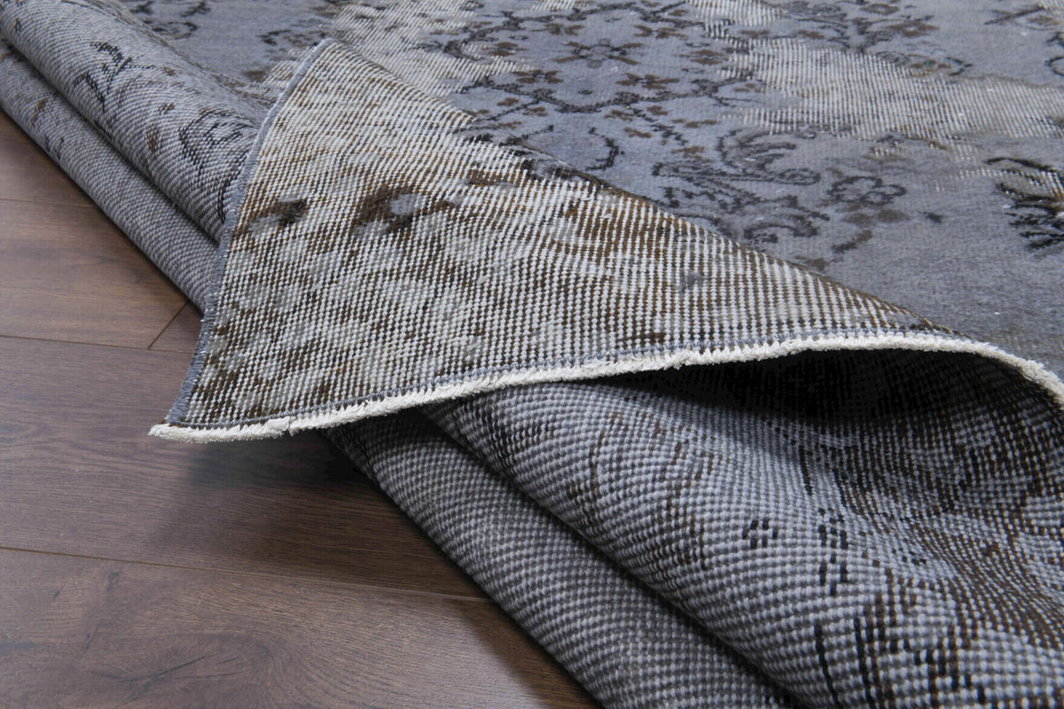 Hand-crafted Anatolian distressed vintage rug Seherbahce in wool, 1950s