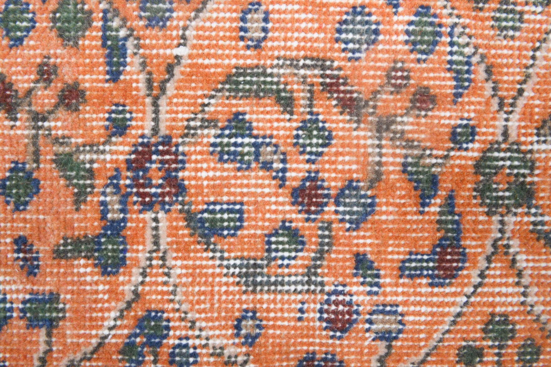 Sahragonca rug: 1970s handmade Turkish rug with bordered and floral motifs and cotton backing