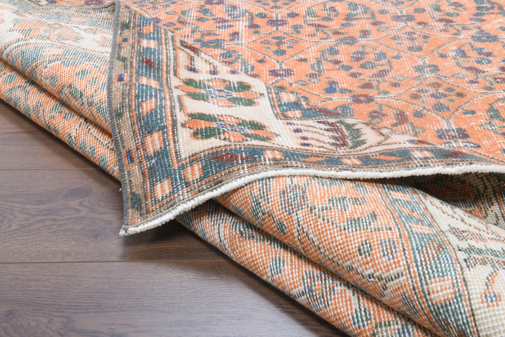 Handmade wool rug from Hereke, Turkey – Vintage Floral Area Hereke Rug 5'11" x 9'5"