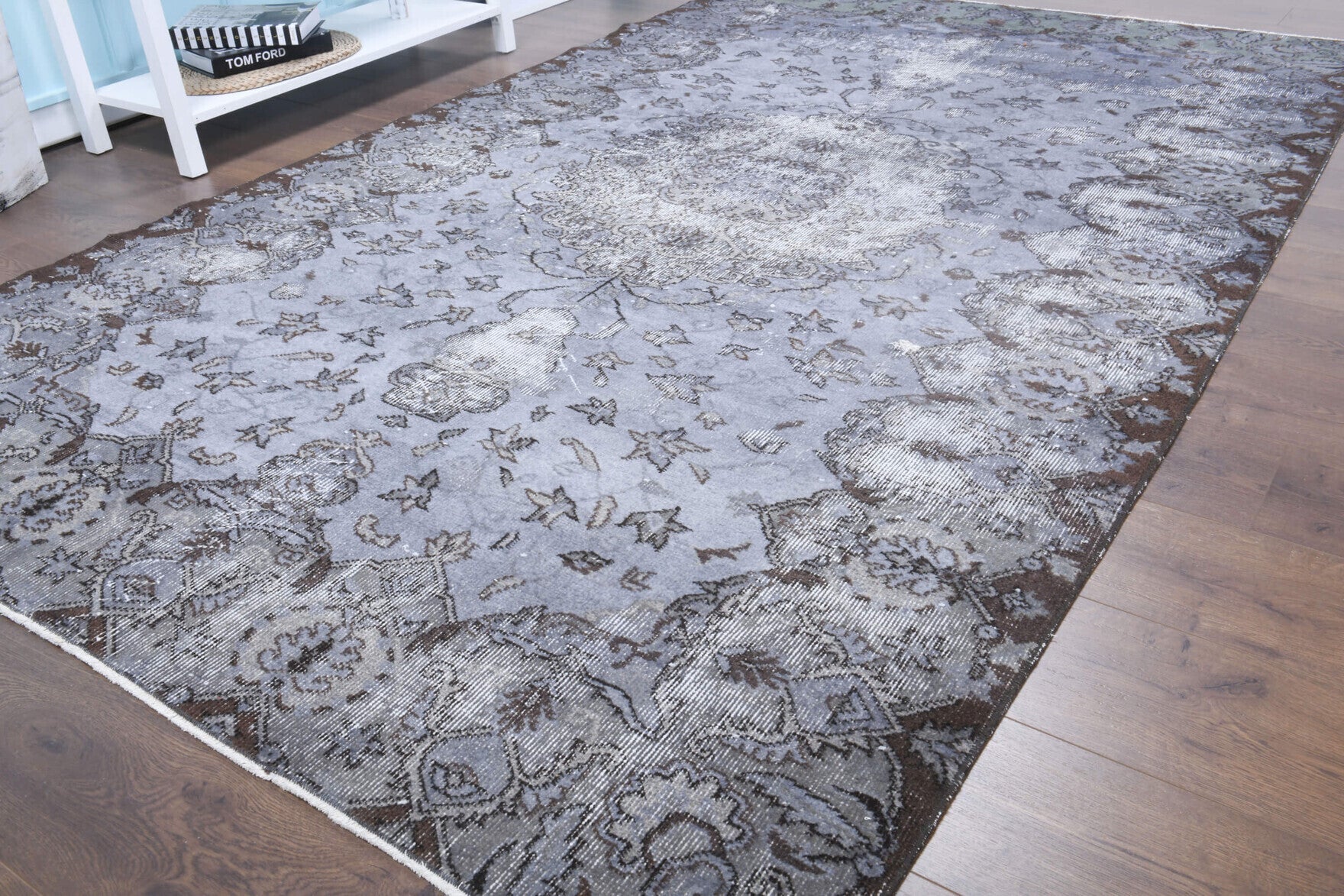 Sadberkcihan rug: 1970s handmade Anatolian rug with oriental motifs and cotton backing