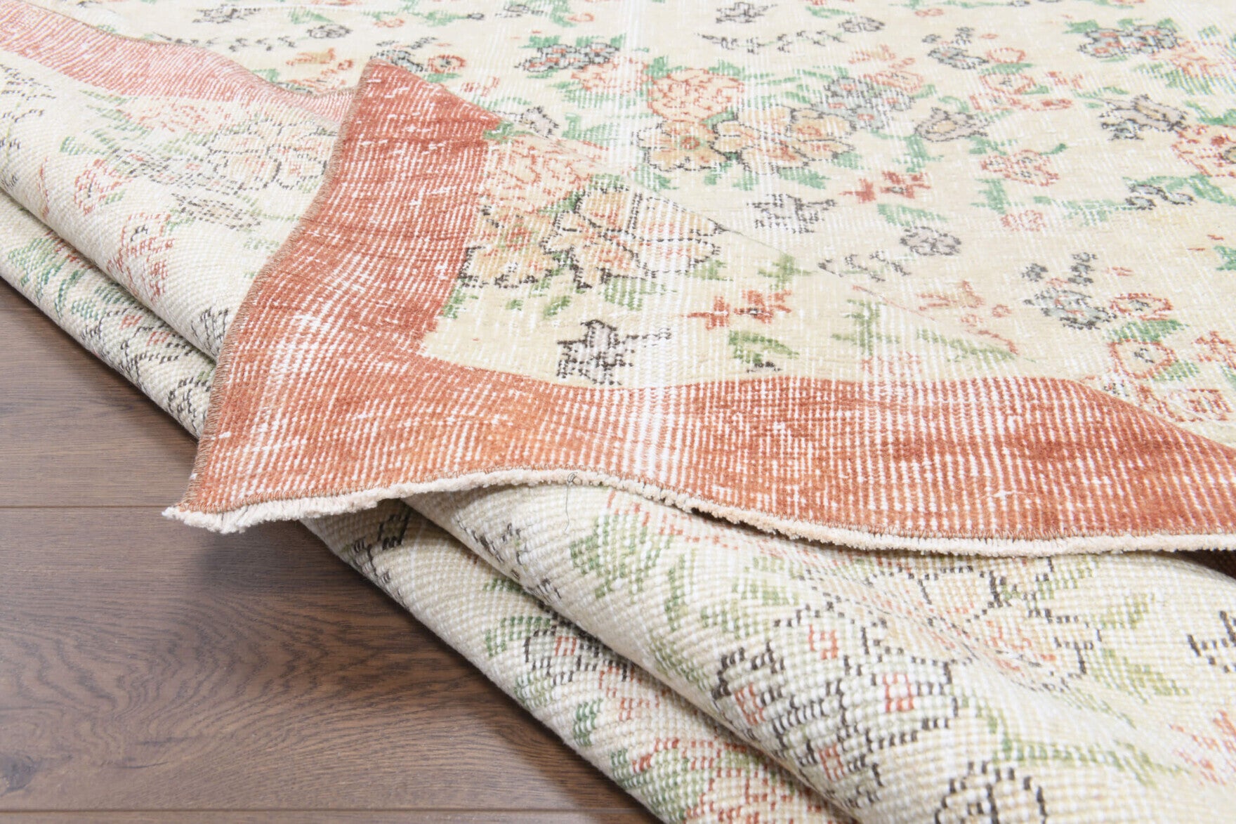 Authentic Anatolian vintage area rug (1970s) with bordered and floral design – one-of-a-kind at Fame Rugs