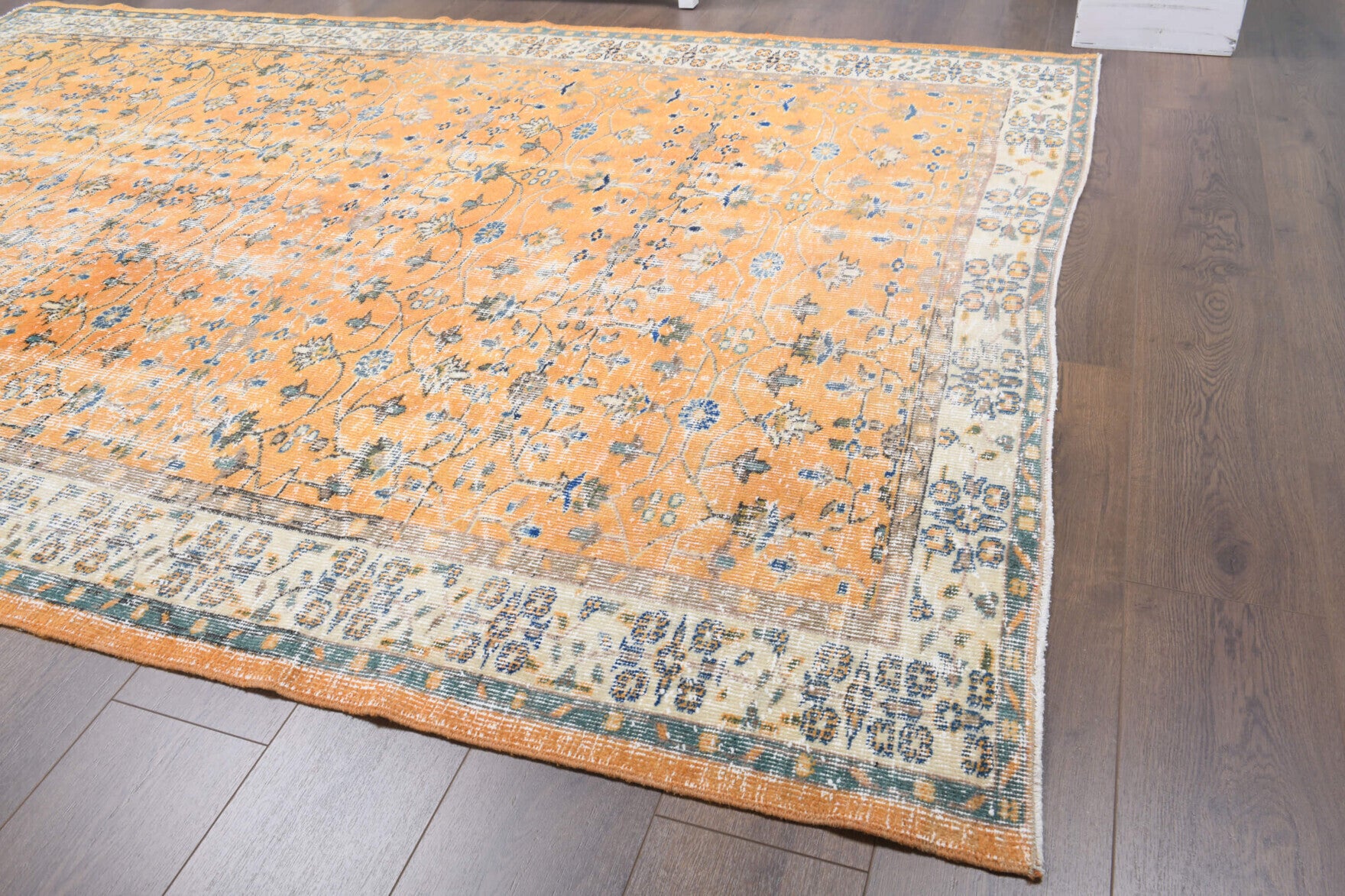 Nurgulnaz rug: 1970s handmade Anatolian rug with floral motifs and cotton backing