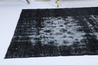 One-of-a-kind 1960s Anatolian overdyed vintage area rug in wool, 4'11" x 8'